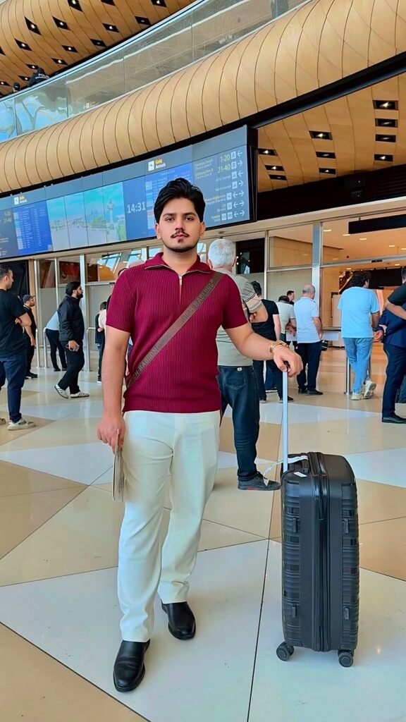 Saqib Jatoi arriving at the airport in Azerbaijan with his suitcase