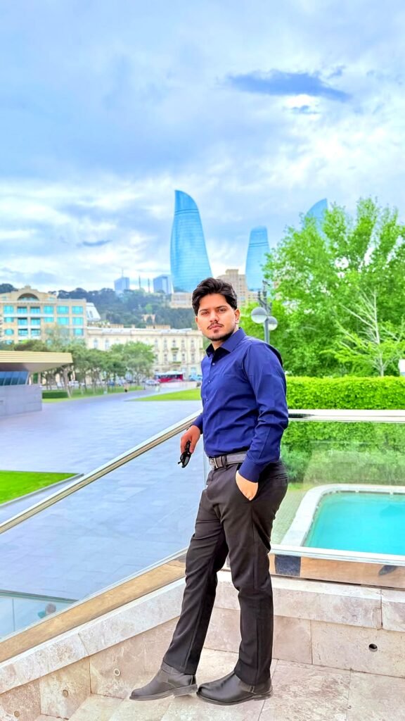 Saqib Jatoi in Baku with the Flame Towers behind him