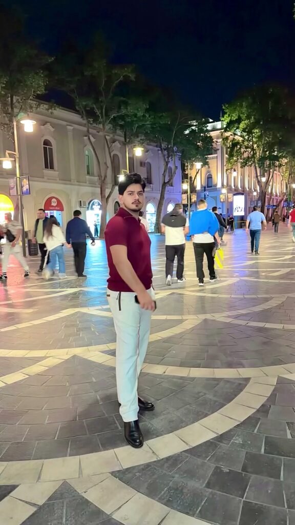 Saqib Jatoi on Nizami Street, Baku, at night